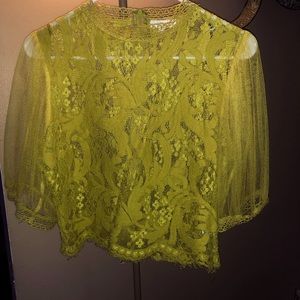 Too cute love this shirt! Lace see through! Mustard color! Zips in the back